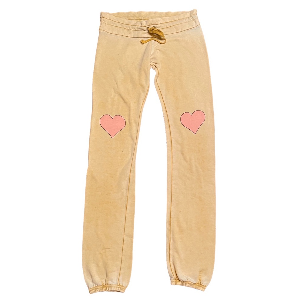 Wildfox Yellow Jogger Sweatpants with Hearts at Knees.